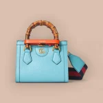 GUCCI Diana粉紅皮革斜背包-702732