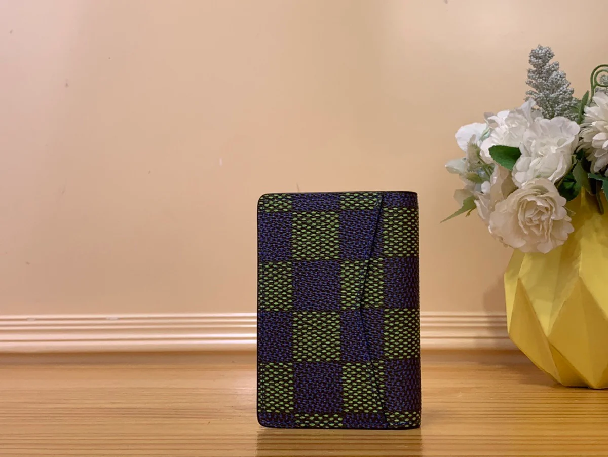 高仿LV 男士Damier Heritage藍綠色萬用錢包 | Pharrell Williams聯名款短夾長夾兩用-N00143 4 高仿LV 男士Damier Heritage藍綠色萬用錢包 | Pharrell Williams聯名款短夾長夾兩用-N00143